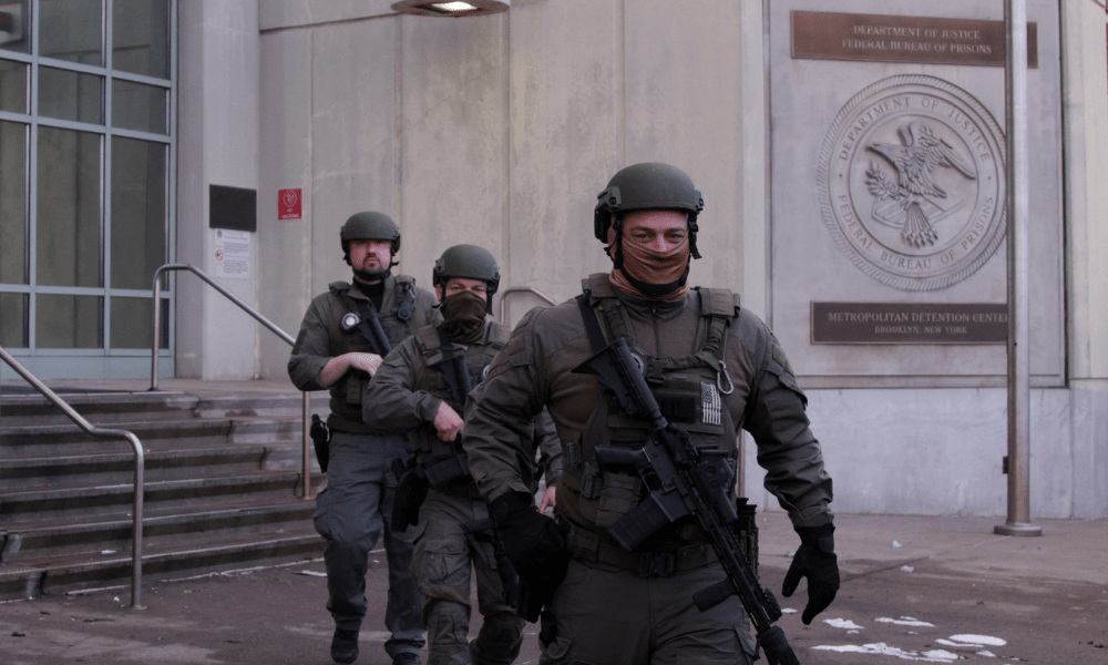 US Department of Justice federal officers stand guard outside the Metropolitan Detention Center, where ousted Venezuelan President Nicolas Maduro is being held, in the Brooklyn borough of New York City, on January 4, 2026. Venezuela's deposed president Nicolas Maduro is scheduled to appear before a federal judge in New York at noon on January 5, to be formally notified about the charges against him, the court said. Maduro and his wife, Cilia Flores, were seized by US forces during a pre-dawn raid on January 3 in Caracas and brought to New York to face charges of "narcoterrorism" tied to alleged trafficking of tons of cocaine into the United States.